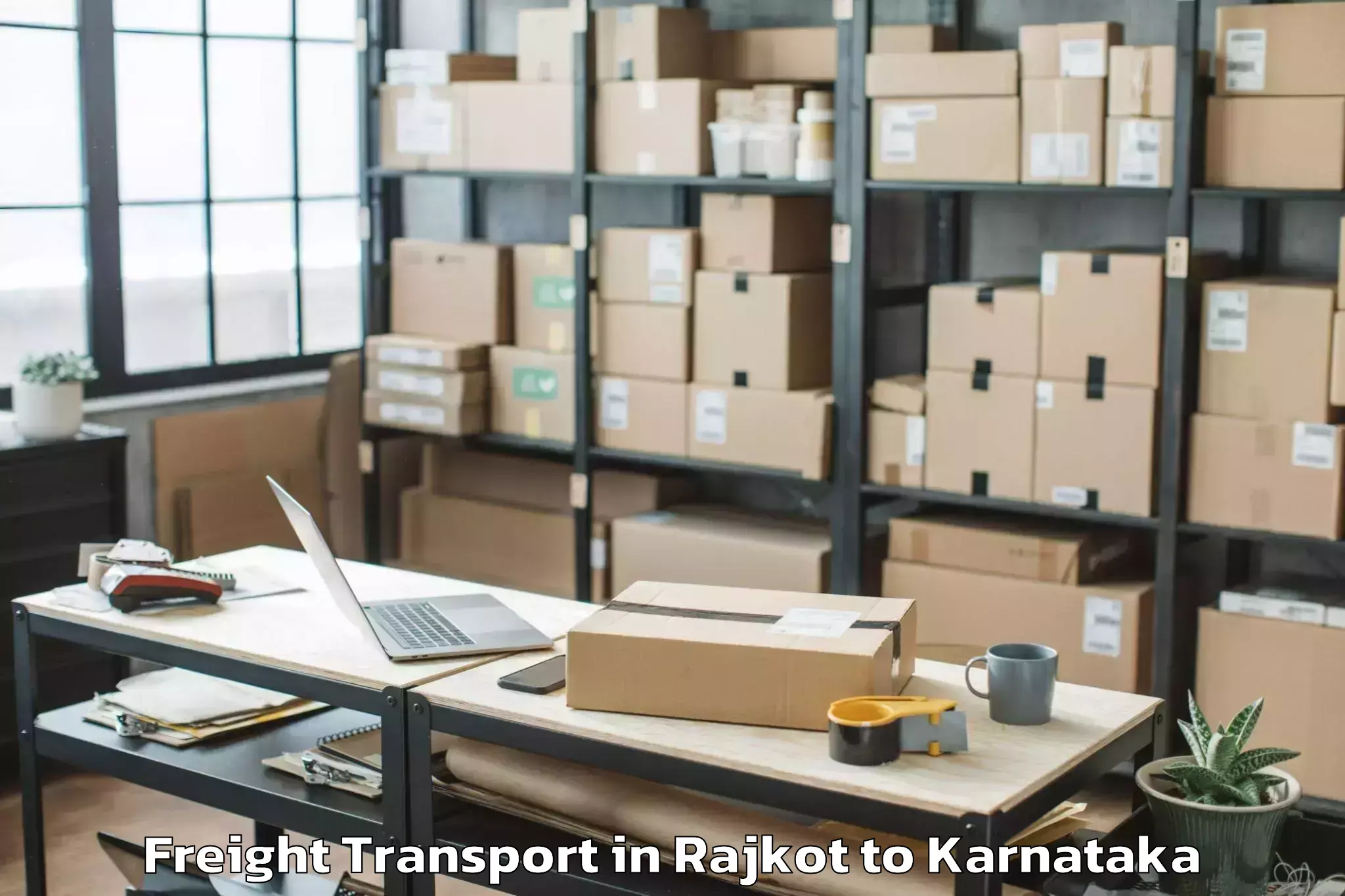 Rajkot to Sri Devaraj Urs Academy Of Hig Freight Transport Booking